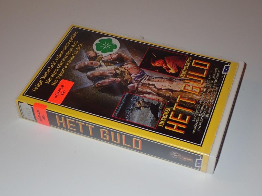 Hett guld med Kim Basinger & Charlton Heston på VHS från VCM