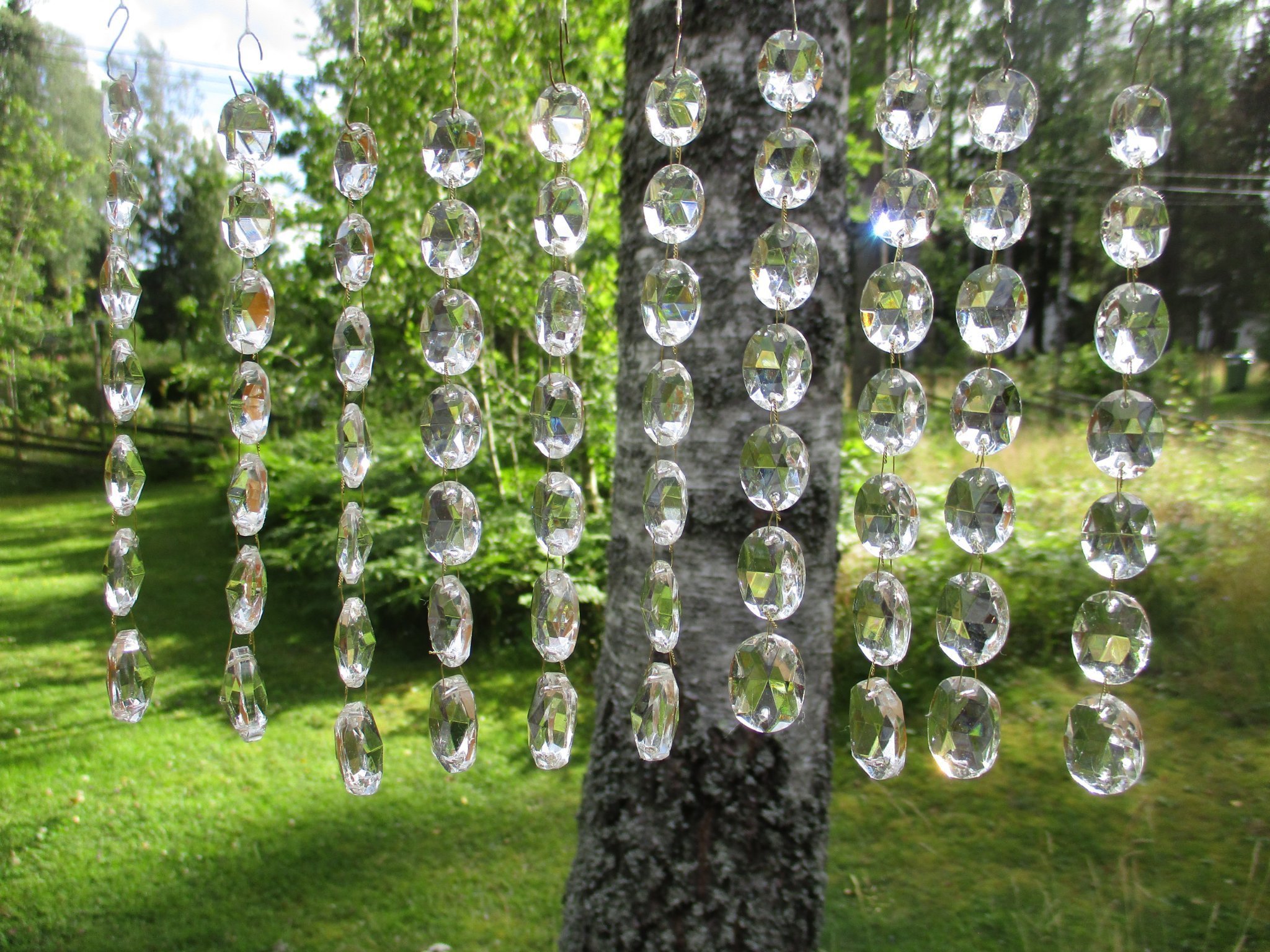 70st ovala kristallprismor. Bundna i 10st längder. Felfria.