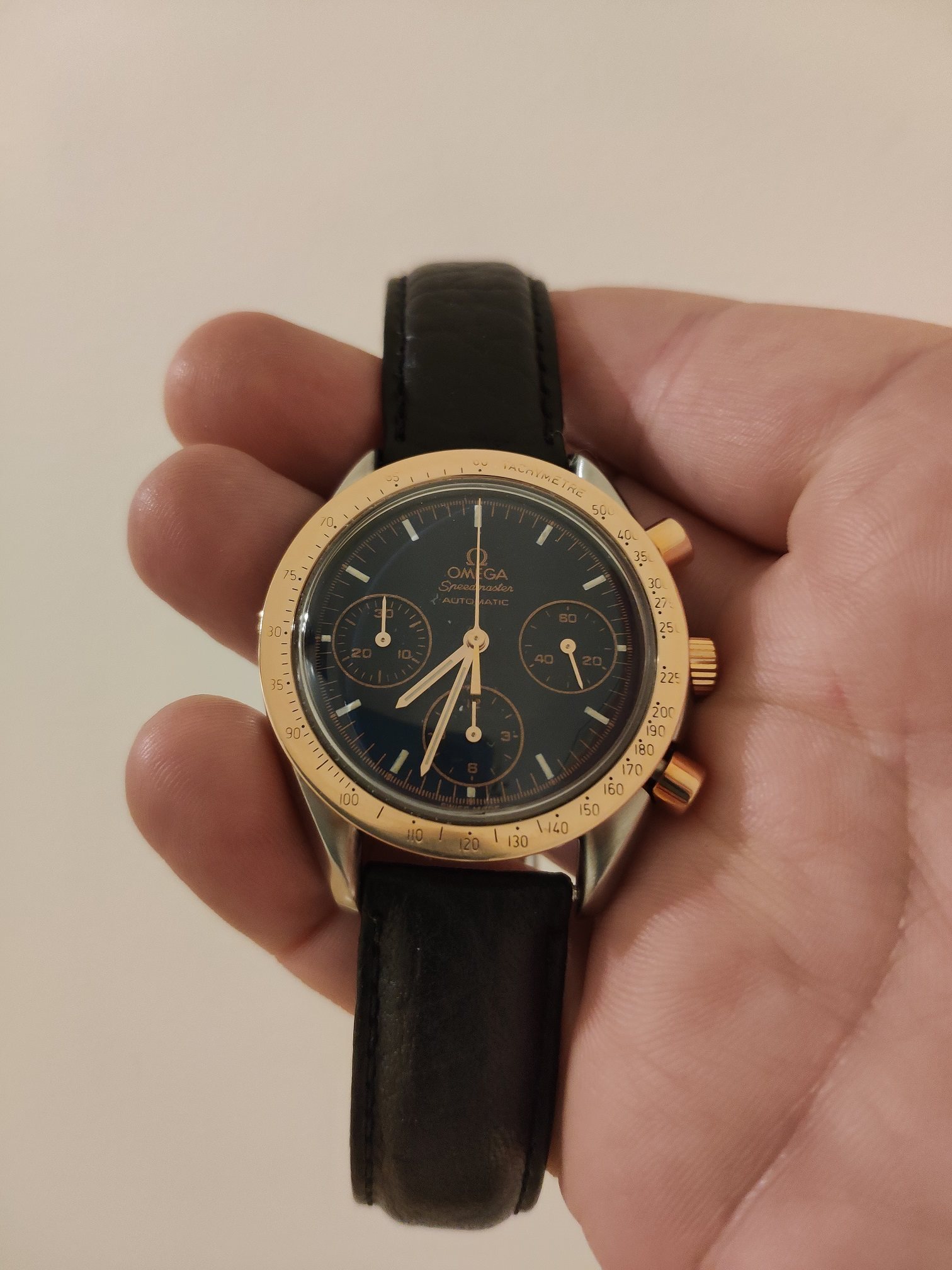 omega speedmaster automatic gold
