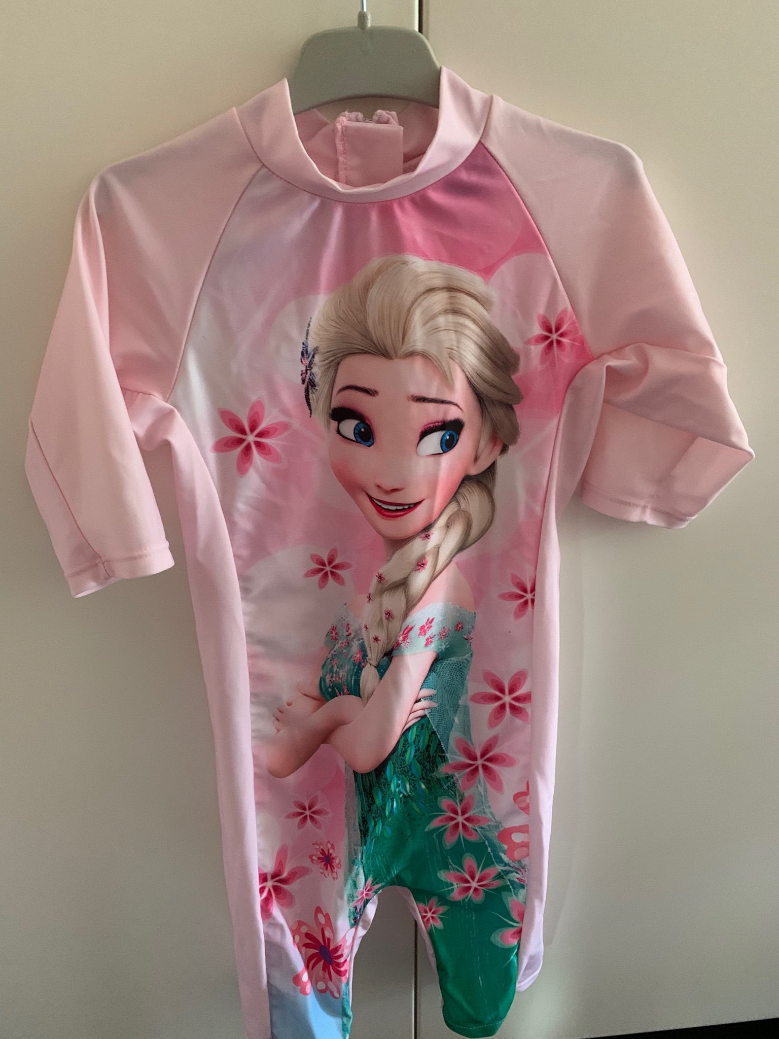 Disney FrozenFrost Elsa rosa UV dräktbadkläder, stl. 122128 Disney FrozenFrost Elsa rosa UV dräktbadkläder, stl. 122128