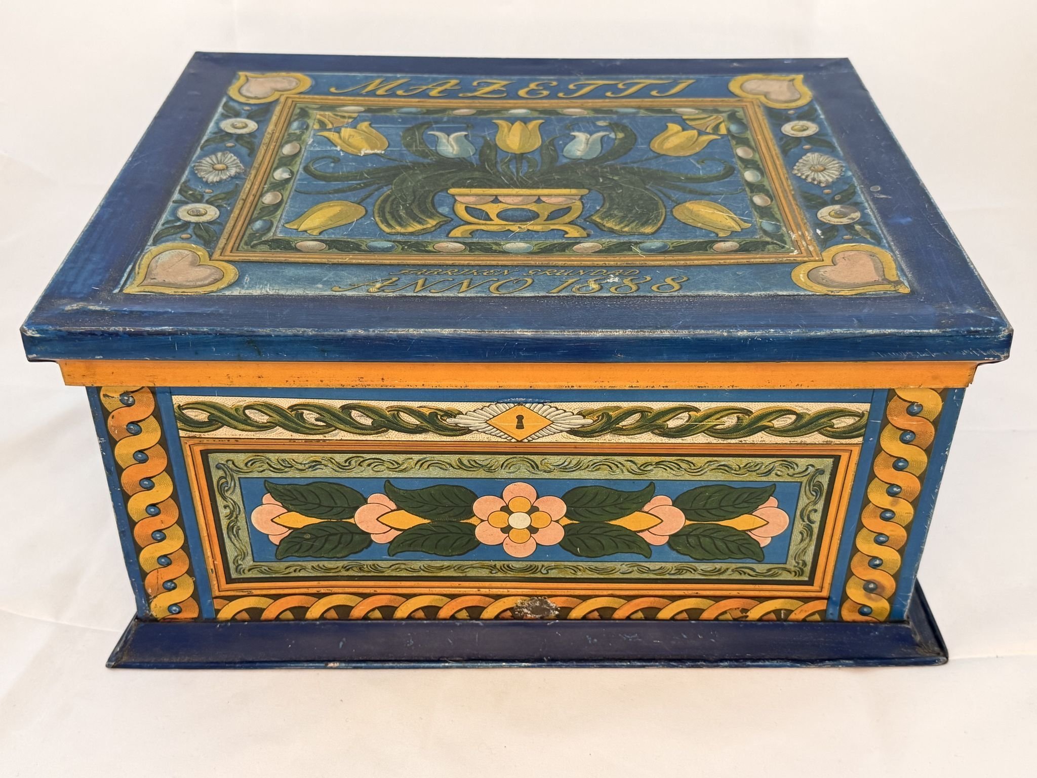 NR58 ÄLDRE STOR BURK PLÅTBURK LITOGRAFERAD BLECKPLÅT MAZETTI DALAMOTIV KURBITS