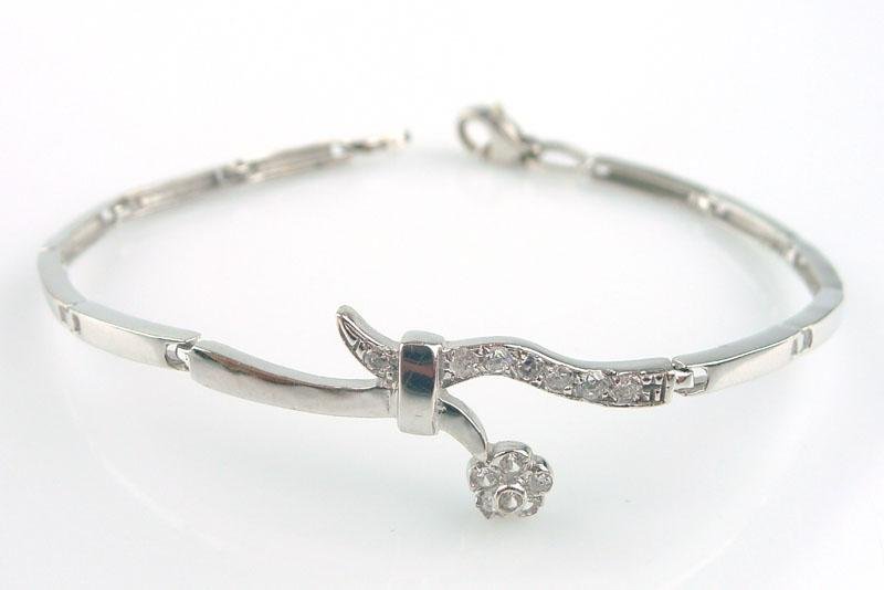ARMBAND, 18K, 18cm, 8,71g, vita stenar, vitguld, b: 2,5 - 16,5mm.