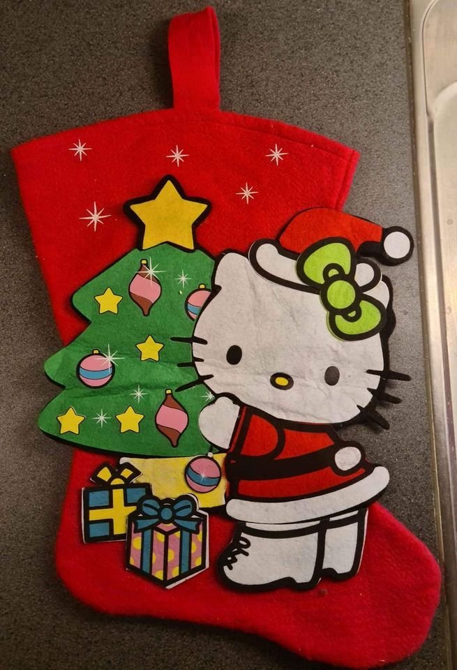 Hello Kitty Jul strumpa Röd Julpynt Juldekorati.. Köp på Tradera