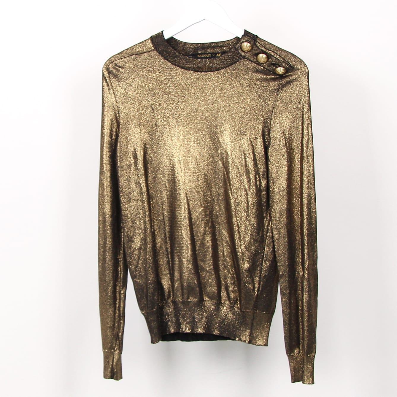 Guldig tröja från Balmain x H&M, strl 38 Guldig tröja från Balmain x H&M, strl 38
