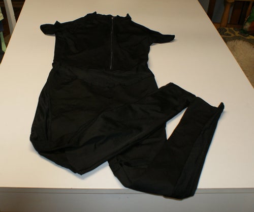 Svart jumsuit/ helkroppsdräkt, storlek M Ny