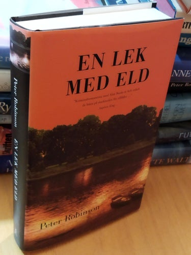 En lek med eld - Peter Robinson. Bok, inbunden. Very Fine plus