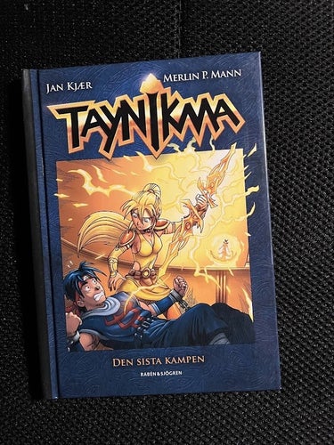 Taynikma. Den sista kampen. / Jan Kjaer & Merlin P. Mann