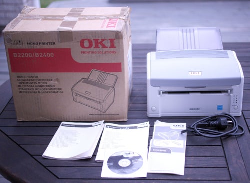 OKI B2400 Mono Laser Printer-Needs updating-comes with original box + papers