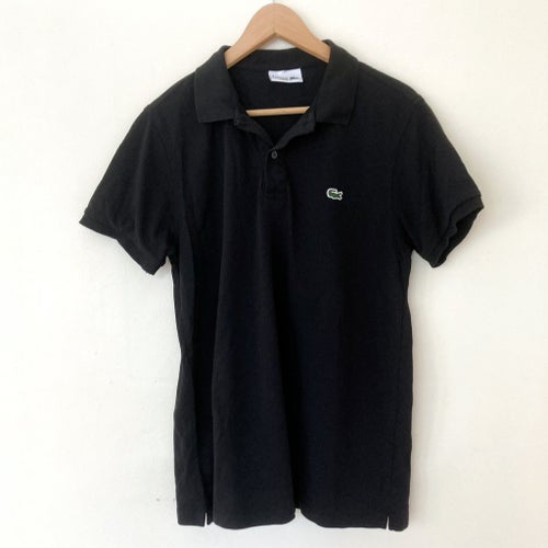 Lacoste svart pikétröja, storlek 5 L