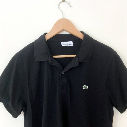 Lacoste svart pikétröja, storlek 5 L