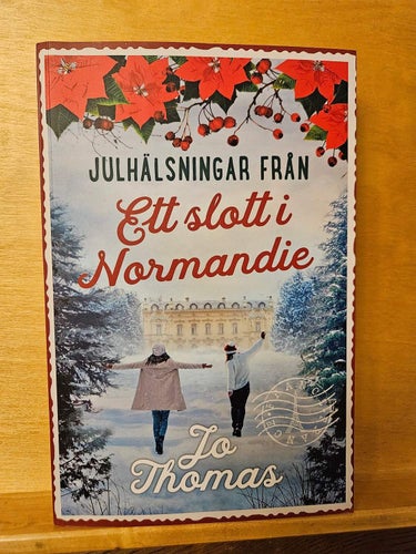 Julhälsning från ett slott i Normandie, Jo Thomas
