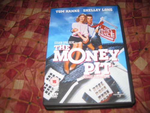 THE MONEY PIT--TOM HANKS OCH SHELLEY LONG