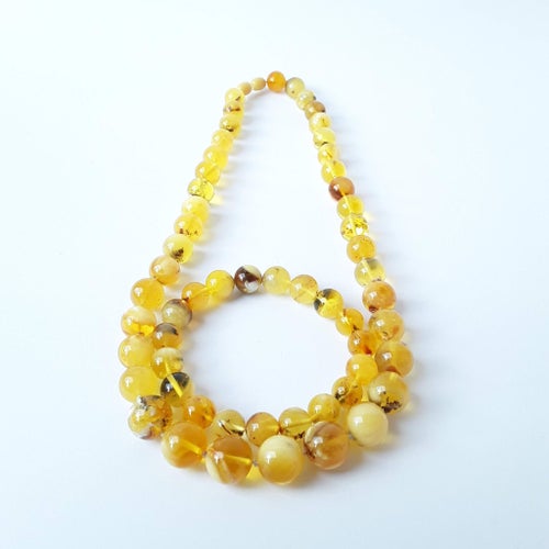 Baltic amber gemstone jewelry set: round bead stretchy bracelet and necklace