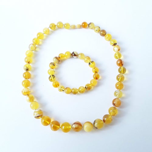 Baltic amber gemstone jewelry set: round bead stretchy bracelet and necklace