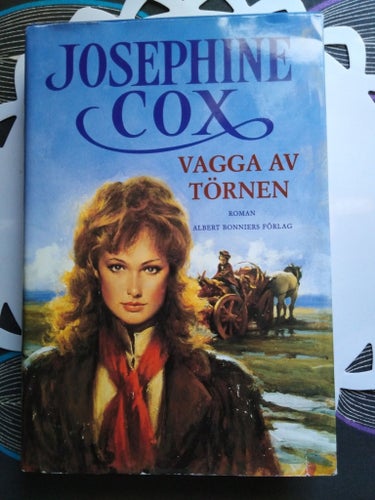Vagga av törnen av Josephine Cox. Inbunden