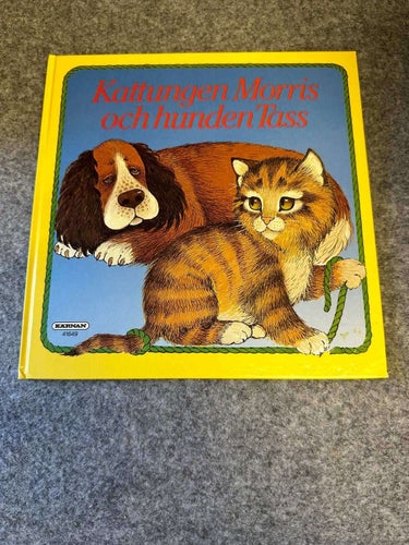 Kattungen Morris och hunden Tass