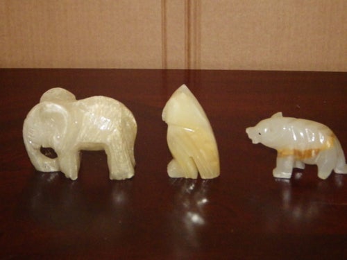 Dekorativa djurfigurer i sten