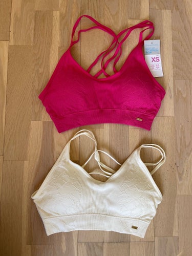 Rosa och vita vadderade toppar från Primark i storlek XS