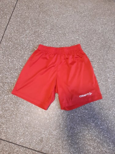 Röda craft träningsshorts Squad Go Short Solid matchshorts 164 170 xs