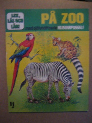 Barnbok -  På zoo : med självhäftande klisterpussel!