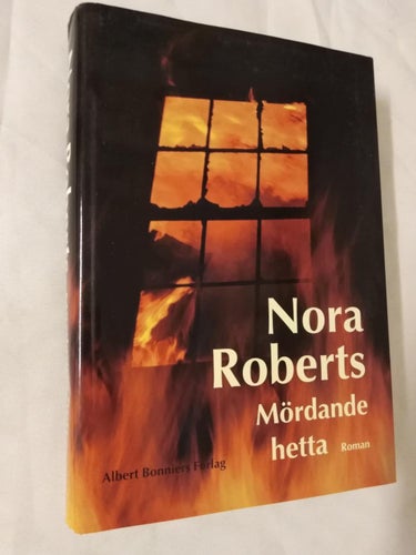 Mördande hetta av Nora Roberts, inbunden bok med skyddsomslag. Very Fine