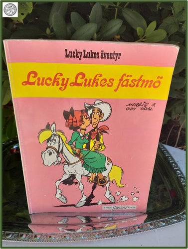 Lucky Lukes fästmö Bonniers Junior förlag Tryckt i Belgien 1986