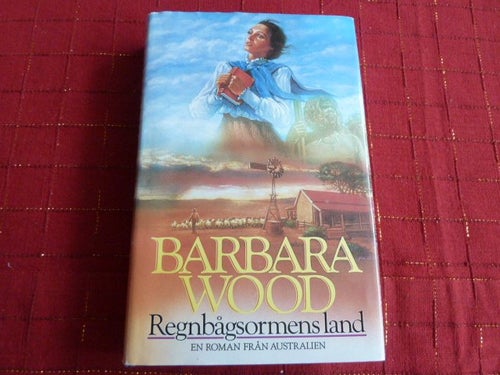 REGNBÅGSORMENS LAND, BARBARA WOOD, 1994, BOK, BÖCKER