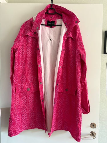 Rosa regnjacka, storlek 46/48, aldrig använd