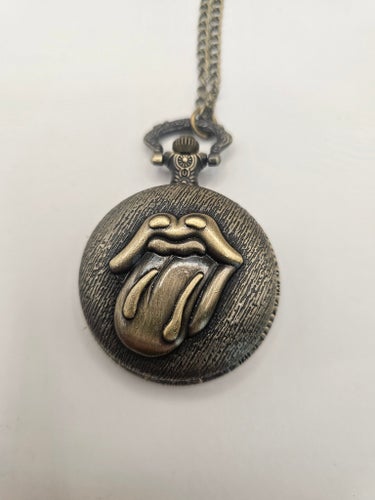 Fickur med Rolling Stones-logotyp