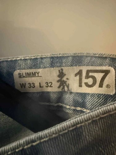 157 ljusblå jeans, storlek W 33 L 32
