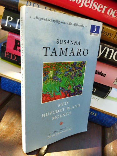 Med huvudet bland molnen av Susanna Tamaro. bok, pocket. Fine plus