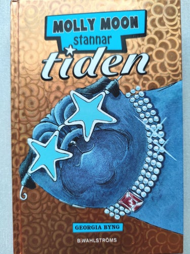 Molly Moon stannar tiden av Georgia Byng (2011)