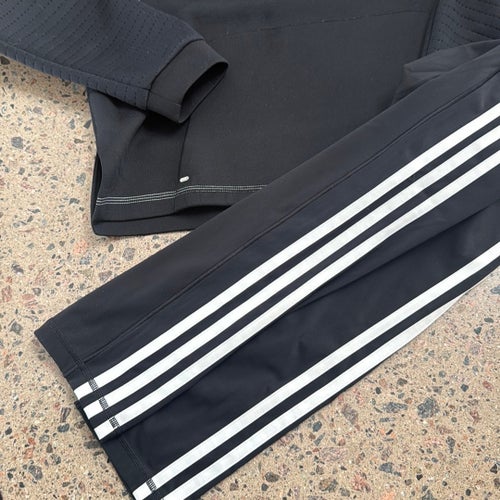 Nike tröja och Adidas byxor