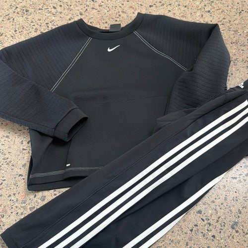 Nike tröja och Adidas byxor