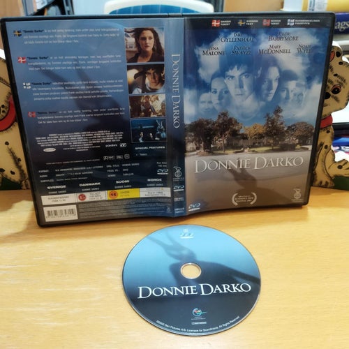 Donnie Darko - Richard Kelly Jake Gyllenhaal Drew Barrymore Patrick Swayze. DVD