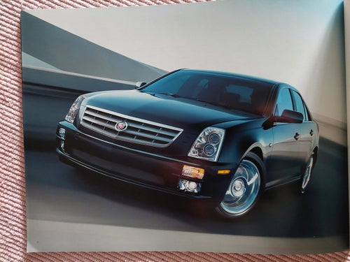 Cadillac STS ..