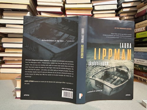 Skyddslingen av Laura Lippman. Bok. Very Fine plus