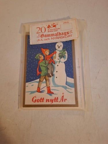 gammeldags Julkort i oöppnad förpackning