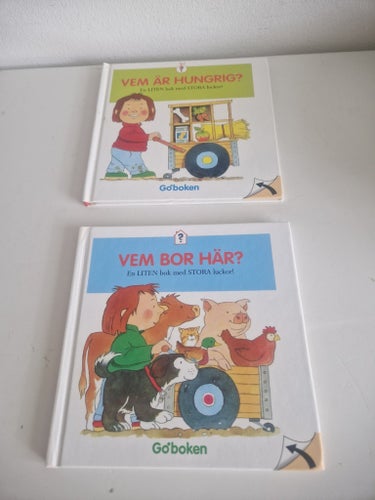 Barnböcker Vem är hungrig? och Vem bor här?