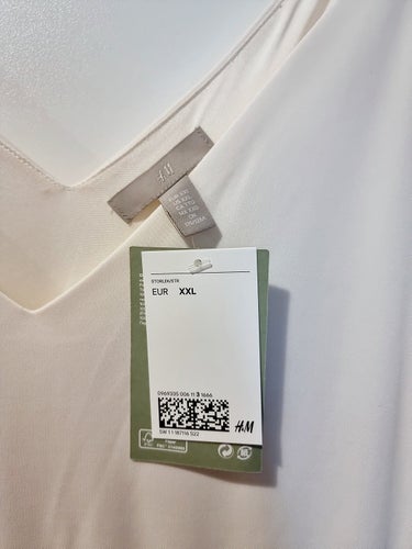 Cremevit klänning från H&M (stl. XXL)