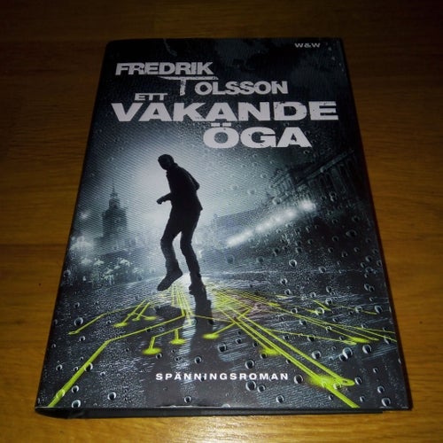 Inbunden: Ett vakande öga av Fredrik T Olsson, Nyskick!