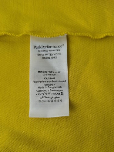 Ny Peak Performance klänning W Tevndress i färgen gul med svart kant och st. XS