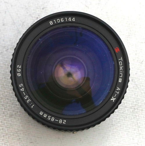 Objektiv Tokina AT-X 28-85 mm 1: 3.5-4.5 mm. Fattning Canon FD.