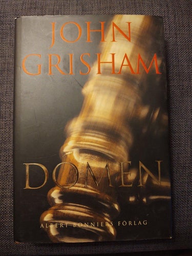 Domen - John Grisham , inbunden i mycket fint skick!