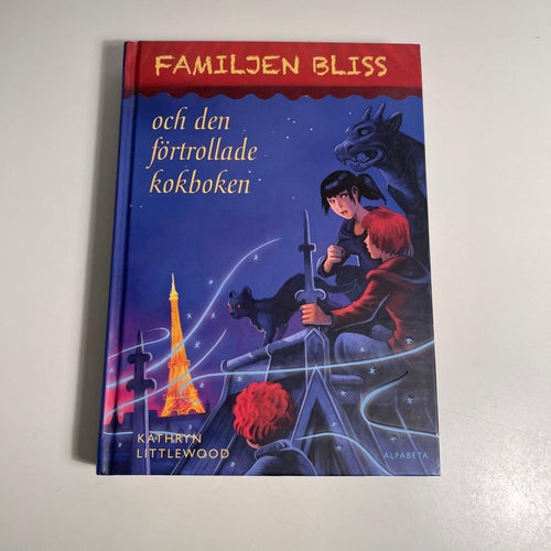Bok - Familjen Bliss och den förtrollade Kokboken. Kathryn Littlewood