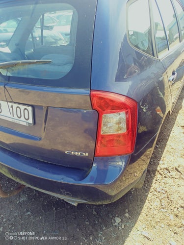 Kia carens
