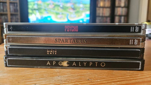 DVD-steelbooks Psycho, Spartacus, The Ninth Gate, Apocalypto