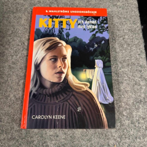 Carolyn Keene - Kitty och damen med lyktan