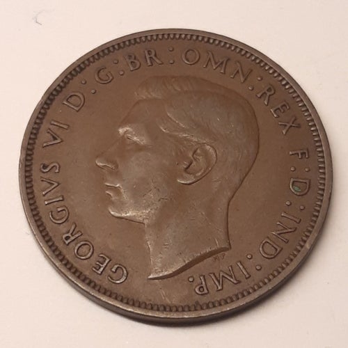Brittisk one Penny från 1939 kung Georg vl bra och fint bruksskick.
