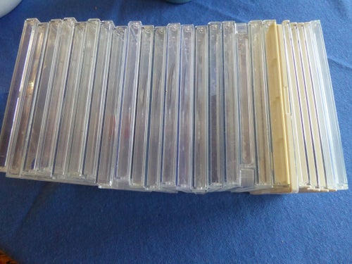25 stycken CD-fodral transparanta och vita